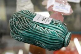 An unusual Chinese glazed pottery water dropper in the form of a pak choi.