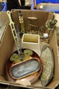A large copper pan, a brass skimmer and other metalware.