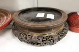 A Chinese carved wood stand.