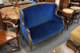 A French style beech framed two seater upholstered settee.