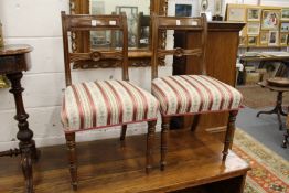 A pair of William IV mahogany single dining chairs.