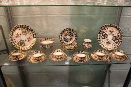 A quantity of Royal Crown Derby Imari pattern cups, saucers and plates etc.