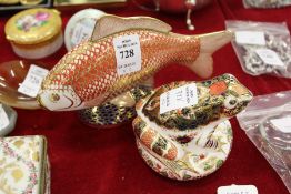 A Royal Crown Derby model of a fish and a frog.