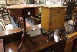 An octagonal gaming / work table together with a bedside cupboard.