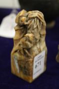 A Chinese carved hardstone seal.