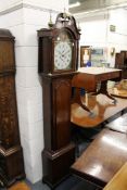 A good 19th century oak longcase clock with well painted arch shaped dial eight day movement with