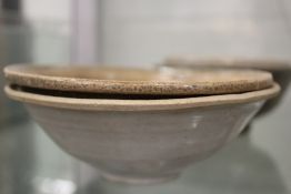 Two early Chinese glazed terracotta bowls.