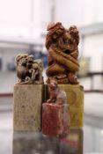 Three Chinese carved soapstone seals.