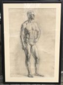 20th Century Russian School, A study of a standing male figure, charcoal, indistinctly signed, 26.5
