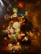 Early 20th century, A still life of mixed flowers in a classical urn on a marble ledge, oil on