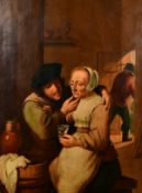 Manner of Teniers, an amorous couple in a tavern interior, oil on panel, 17.5