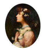 M. Morris (20th century) A head and shoulders profile portrait of an elegant lady holding flowers,