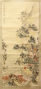 A CHINESE SCROLL PAINTING OF A LANDSCAPE, painted to depict a figure in a building within a native