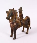A 17TH CENTURY SOUTH INDIAN BRONZE MODEL OF A HORSE AND RIDER, 12cm long.