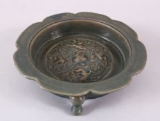 A CHINESE RU WARE CELADON MOULDED CHILONG CERAMIC FOOTED DISH, with raised chilong central