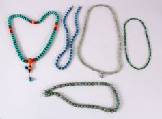 A MIXED LOT OF FIVE CHINESE HARDSTONE CARVED NECKLACES, various sizes. (5)