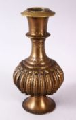 AN INDIAN BRONZE RIBBED BODY HUQQA BASE, with a ribbed body decoration, 22cm.
