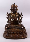 A LARGE TIBETAN BRONZE FIGURE OF BUDDHA, in a seated position with gilt highlights, in laid with