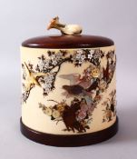 A JAPANESE MEIJI PERIOD CARVED IVORY & SHIBAYAMA TUSK POT, the body inlaid with semi precious shells