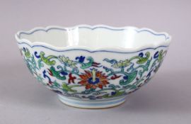 A CHINESE MING STYLE DOUCAI PORCELAIN BOWL, decorated with chrysanthemum and lotus, the base with