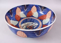 A JAPANESE MEIJI PERIOD ARITA / IMARI PORCELAIN PUNCH BOWL, decorated with floral motif with a