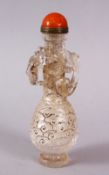A CHINESE ROCK CRYSTAL STYLE PEKING GLASS CARVED SNUFF BOTTLE, carved with archaic style with a