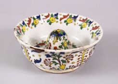 A TURKISH KUTAHYA POTTERY LEMON JUICER / SQUEEZE, decorated with floral decoration 14.5cm
