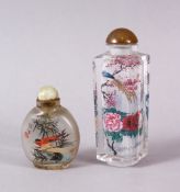 TWO CHINESE REVERSE PAINTED SNUFF BOTTLES, One with floral scenes, the other with birds, 9cm & 5cm.