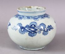 AN EARLY BLUE AND WHITE POTTERY VASE, possibly Persian Safavid, 15cm diameter.