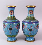A PAIR OF CHINESE CLOISONNE DRAGON VASES, with ablule ground depicting dragons and pearls, with