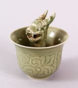 A CHINESE LONGQUAN STYLE CELADON PORCELAIN DRAGON CUP, decorated with incised motif and an