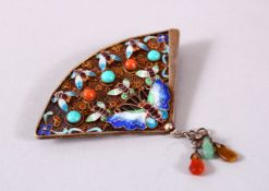 A CHINESE SILVER GILT & ENAMEL FAN SHAPED BROOCH, with butterflies and semi precious stones, with