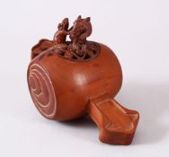 A JAPANESE CARVED WOODEN CARVED KORO, carved in the form of daikoku mallet, with a pierced cover
