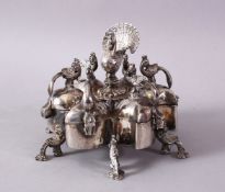 AN INDIAN WHITE METAL SIX CONTAINER SPICE BOX, with peacock bird central screwing lock with bird