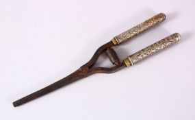 A PAIR OF 19TH CENTURY CURLING TONGS, with Thai embossed silver handles, 22.5cm long.