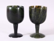 A GOOD PAIR OF MUGHAL CARVED SPINACH GREEN JADE GOBLETS, 10cm high X 5.6cm diameter