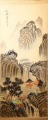A CHINESE PAINTED SCROLL PICTURE OF A LANDSCAPE, the picture painted to depict a mountainous
