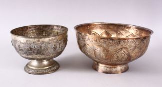 TWO BURMESE WHITE METAL BOWLS, each with relief decoration, one with roundel's of figures, 16cm