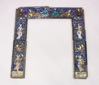 A SET OF PERSIAN QAJAR MOULDED POTTERY TILES FORMING A FIRE SURROUND, the tiles decorated with