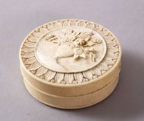 A JAPANESE MEIJI PERIOD CARVED IVORY CYLINDRICAL BOX, carved in relief with floral display, 6cm