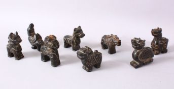 A MIXED LOT OF CHINESE CARVED DARK HARDSTONE FIGURES, of various animals, tigers, rams, horses