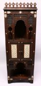 A LATE 19TH CENTURY MOORISH STANDING CORNER CABINET, profusely carved decoration, inlaid and inset