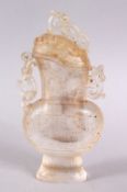 A CHINESE CARVED GLASS VASE & COVER, carved with archaic formed chilong, 18cm high x 9cm