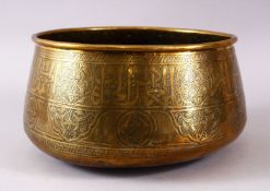 A 19TH CENTURY DAMASCUS MAMLUK REVIVAL BRASS BOWL with engraved decoration, 25cm diameter.