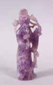 A CHINESE CARVED AMETHYST FIGURE OF GUANYIN, stood holding a scepter and staff, 12.5cm