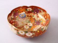A JAPANESE SATSUMA CERAMIC MILLEFLEUR BOWL, decorated with thousand flower style decoration with