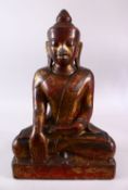 A FINE EARLY STONE THAI SEATED BUDDHA, in Bhumisparsha Mudra pose, with traces of red lacquer and