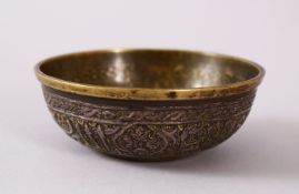 AN ISMALIC SILVER INLAID BRASS BOWL, with inlaid calligraphy, the interior with a signature mark