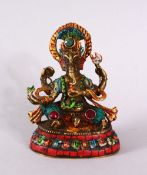 A TIBETAN BRONZE FIGURE OF AN ELEPHANT GOD, with multi arms and poly chrome decorated, inlaid with