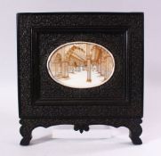 A GOOD LATE 19TH CENTURY INDIAN OVAL MINIATURE PAINTING ON IVORY depicting an architectural interior